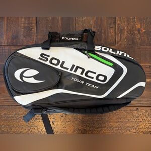 The Solinco Tour 15-Pack Racquet Bag in Black, White and Green. EUC.